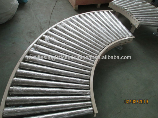 Heat Resistant JS Curved Roller Conveyor System Spinning Roller Conveyor Table